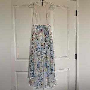 Beautiful dress, upper bodice with flowy floral design on the skirt